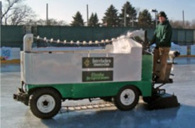 Steve Gilles behind the wheel of the Interlachen Country Club's restored paddle and chain machine in Minneapolis, MN.                        