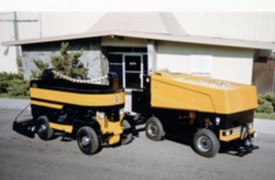 Machine No. 21 post-restoration and its contemporary cousin prepare for shipment to Boston.